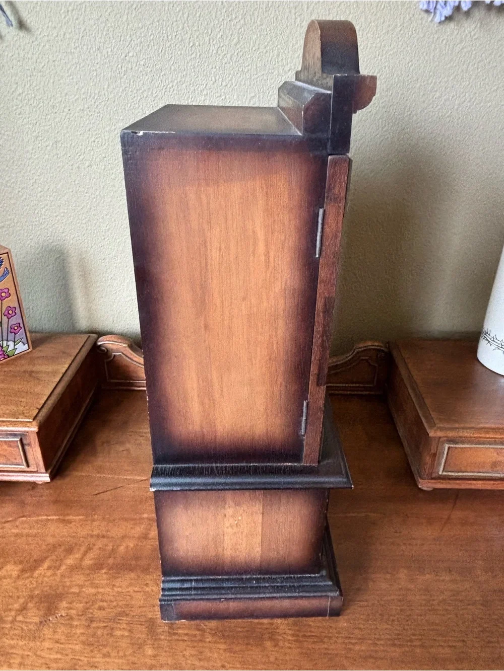 Antique wood jewelry box with drawers and metal hardware